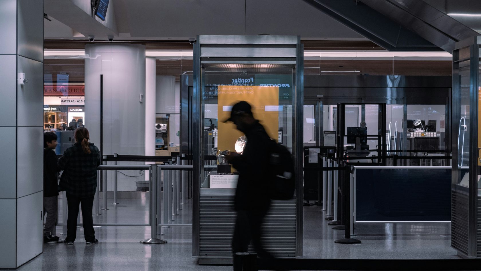 What items should not be placed into the airport security box?