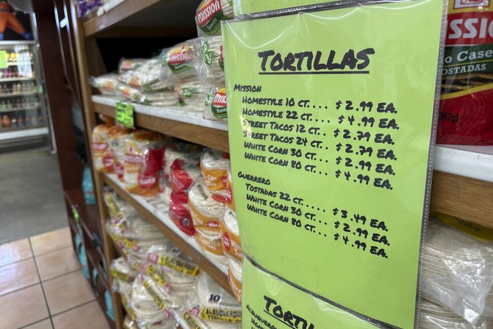 Stacks of corn and wheat flour tortillas fill grocery store shelves in Albuquerque, New Mexico, on Thursday, April 10, 2025. (AP Photo/Susan Montoya Bryan)