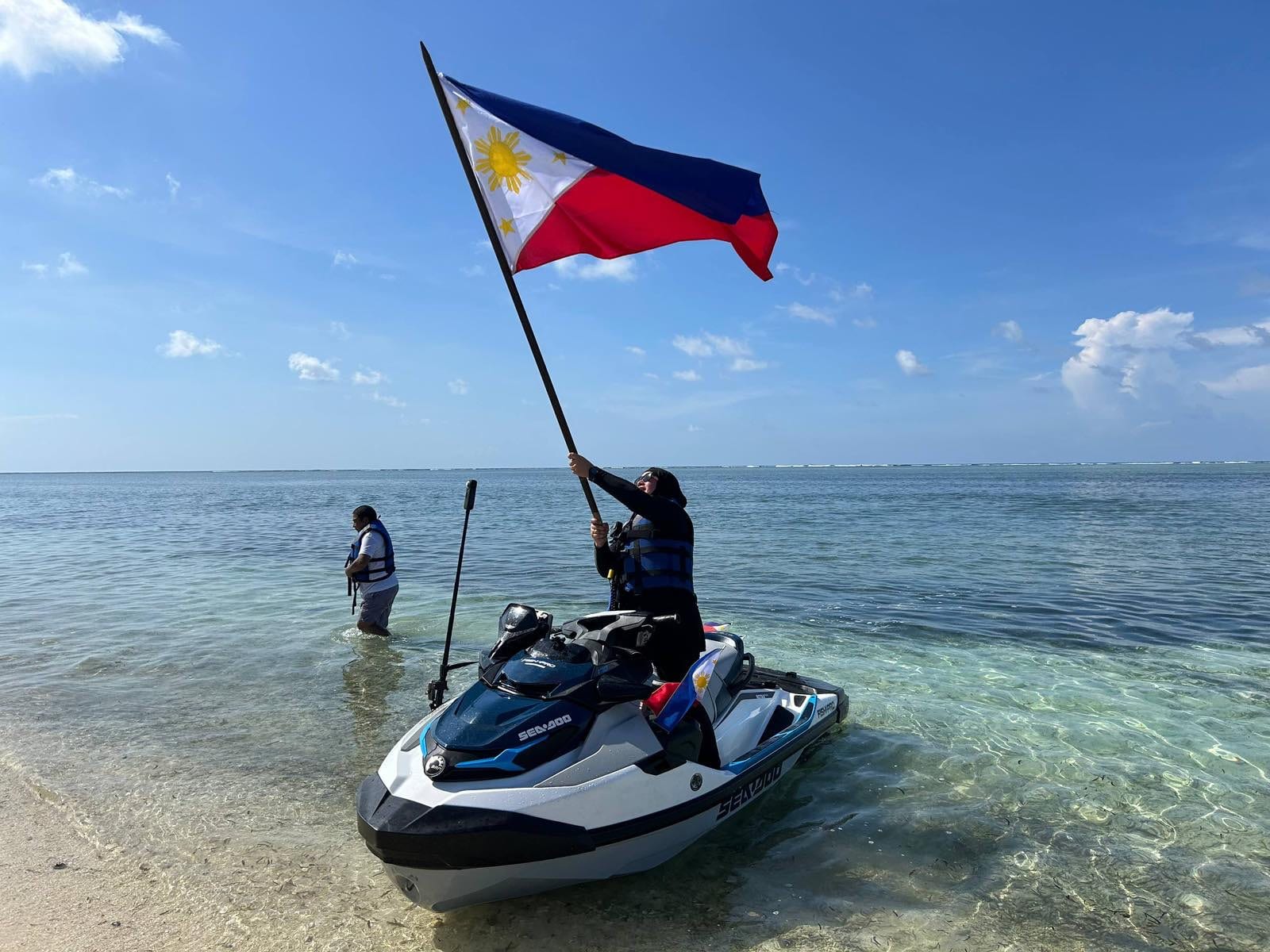Atin Ito holds first patriotic jetski flag ride off Pag-asa Island