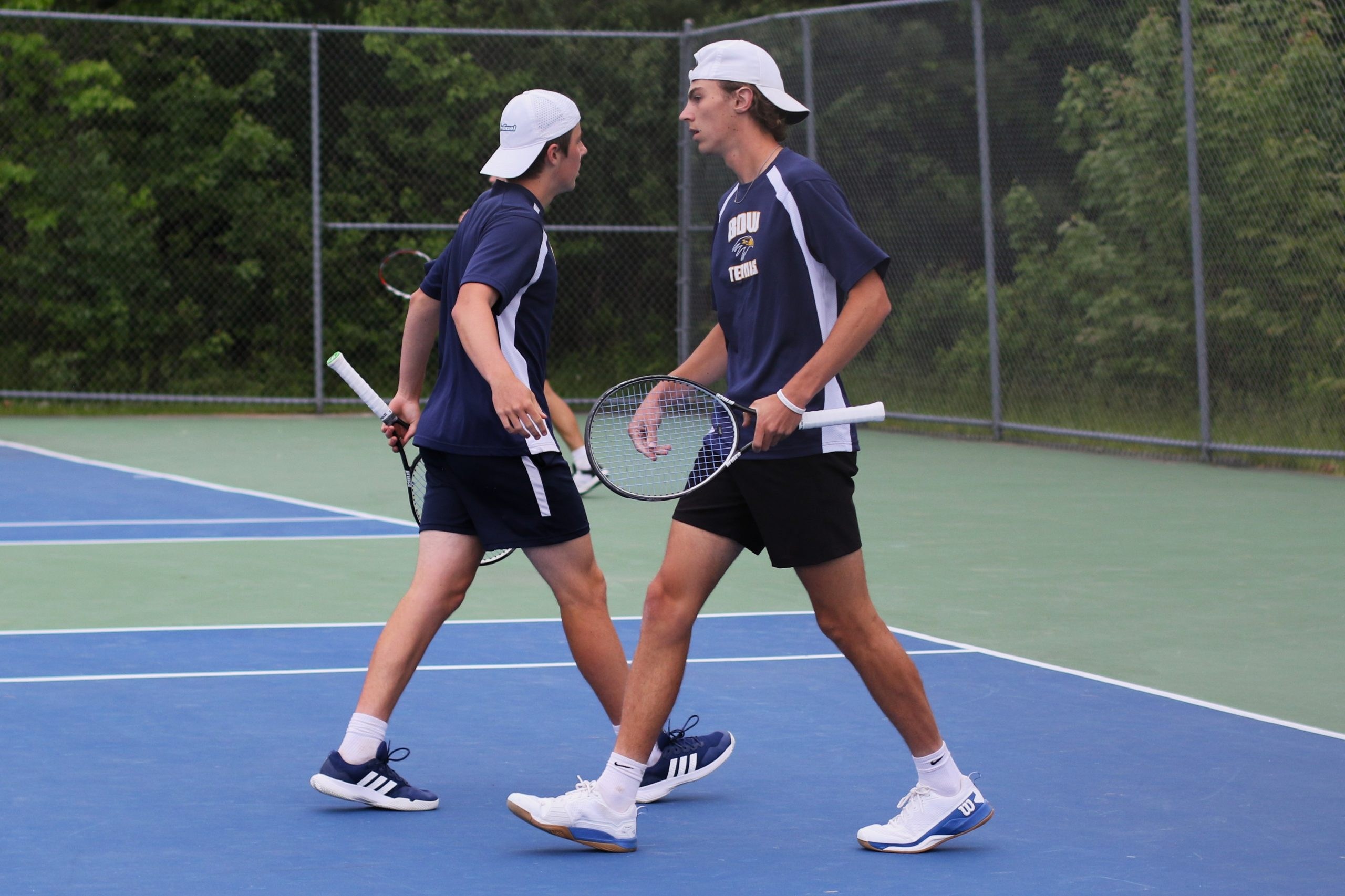 Bow boys' tennis secures semifinal spot after big win