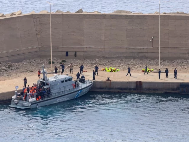 a greek coast guard vessel transfers activists of the global sumud flotilla which was intercepted on international waters by the israeli navy at the port of atherinolakkos on the island of crete greece may 1 2026 photo reuters