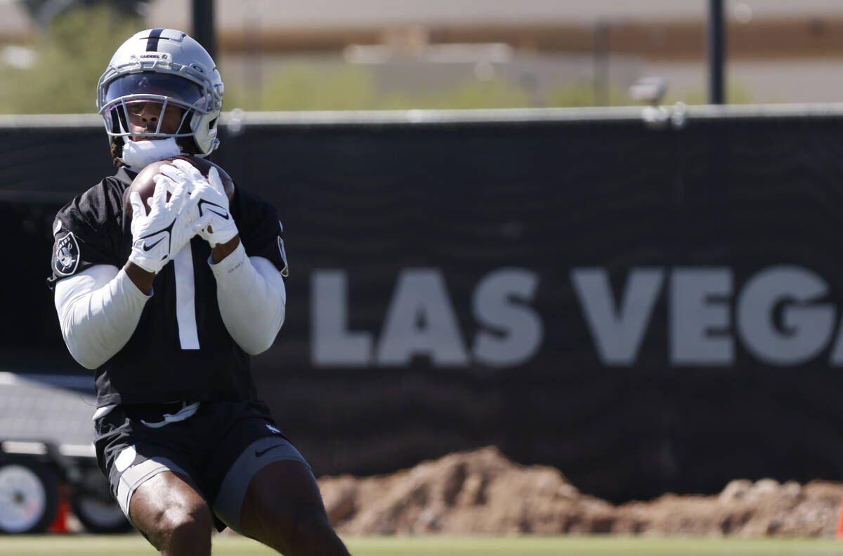 Raiders wide receiver Tre Tucker (1) catches the ball during organized team activities at the I ...