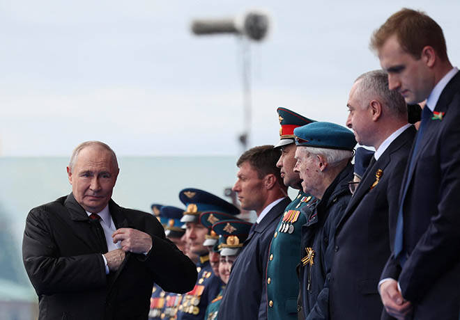 Less-muscular victory day parade shows Putin’s growing vulnerability