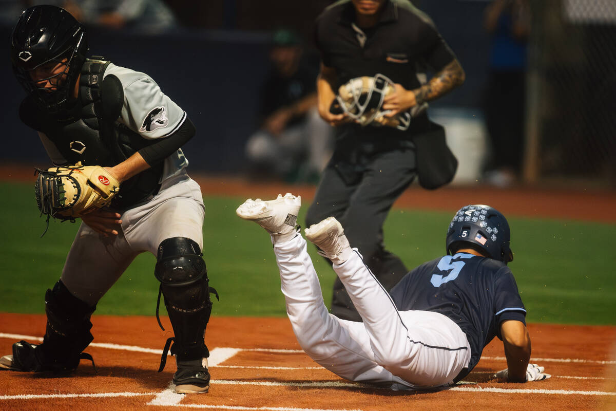 Centennial’s Marco Perez (5) slides to home plate during a 5A Southern Region eliminatio ...