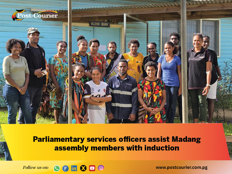 Parliamentary services officers assist Madang assembly members with induction