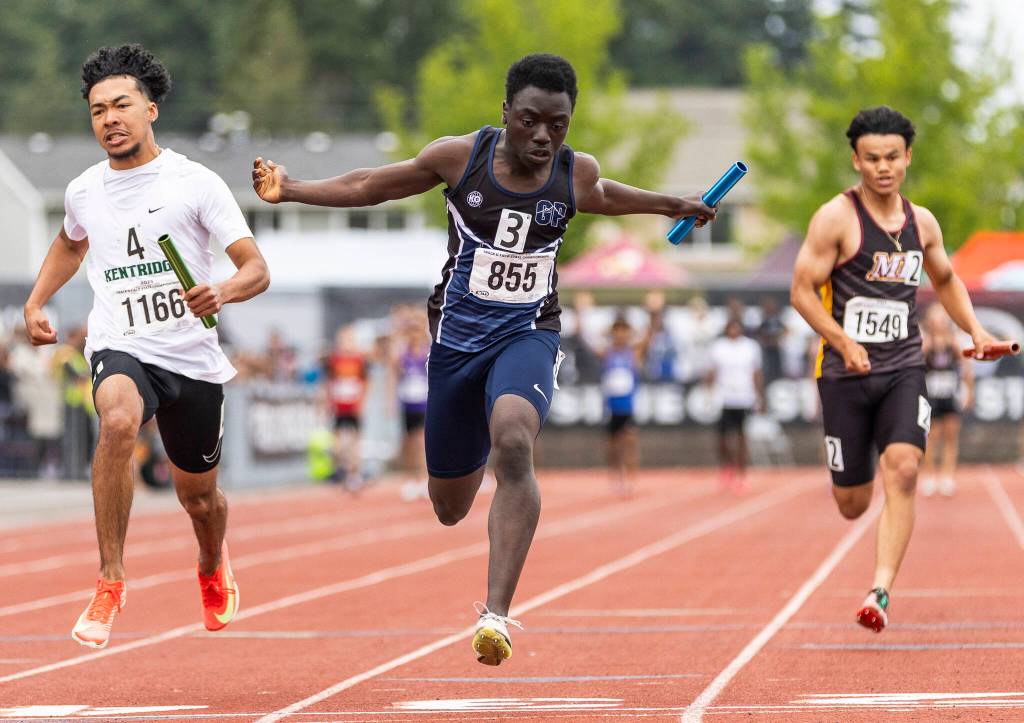 Glacier Peak’s Alieukama Badjie crosses the finish line in the 4A boys 4x100 relay final on Saturday, May 31, 2025 in Tacoma, Washington. (Olivia Vanni / The Herald)
