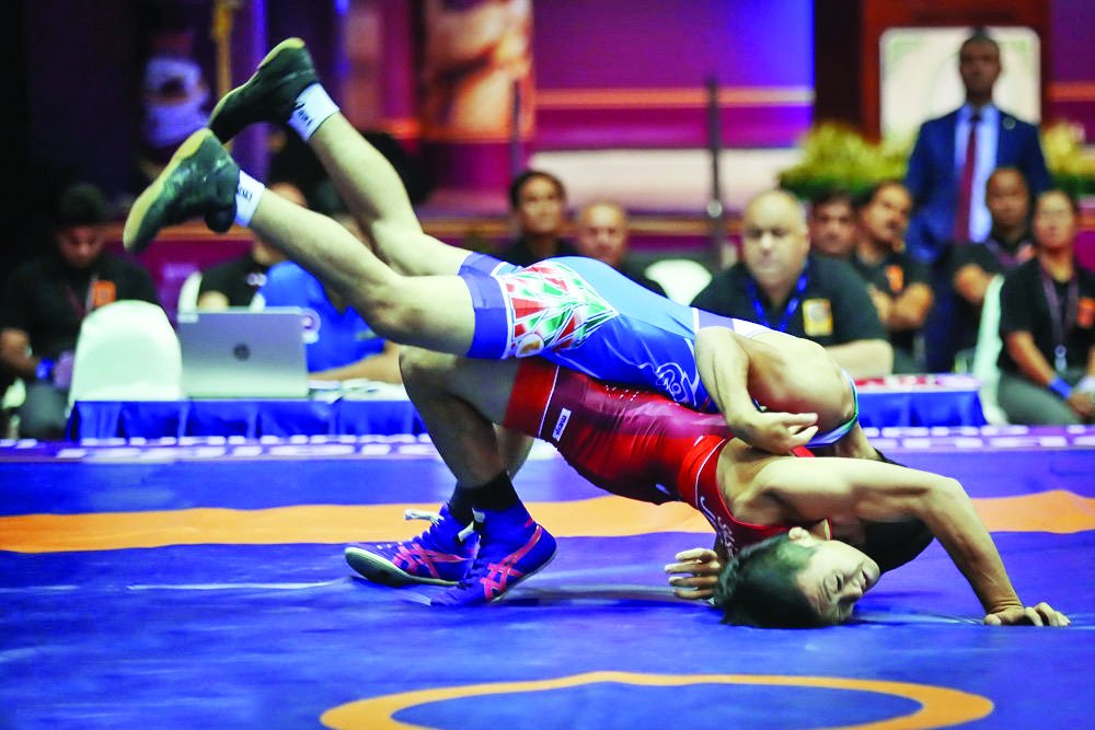 Pres. congratulates junior Greco-Roman wrestling team on win