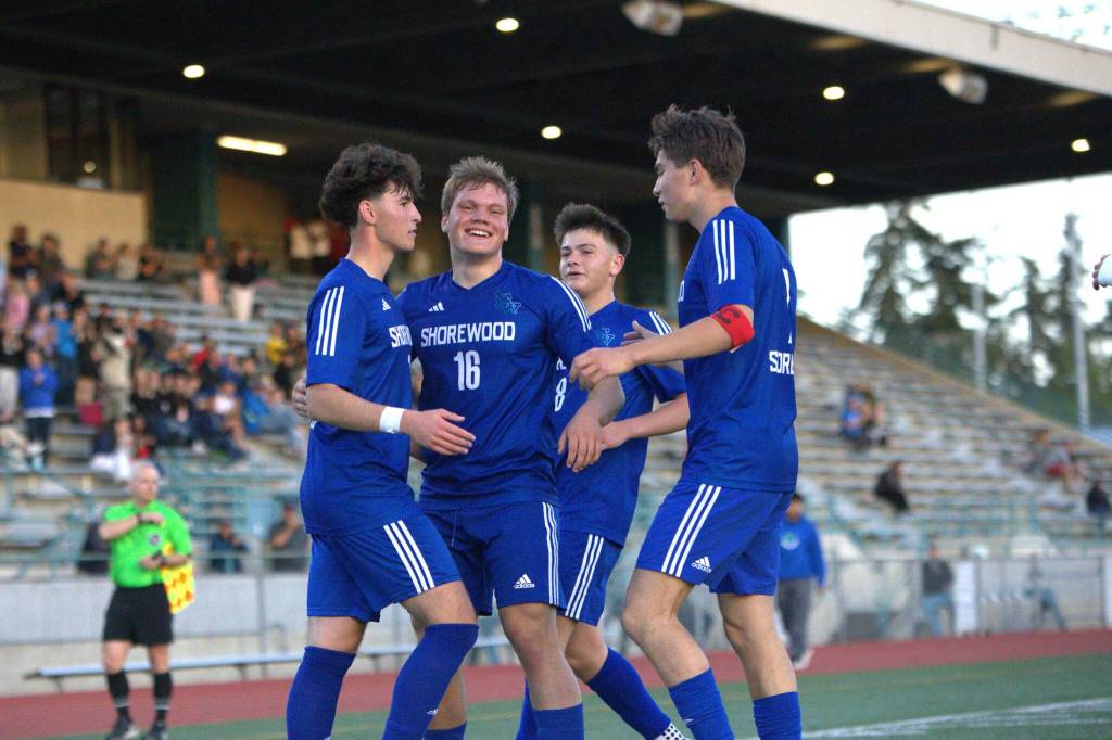 Shorewood’s Caleb Butler celebrates his goal with his teammates during a state round of 16 game against Mountain View on Friday, May 22, 2026 at Edmonds School District Stadium in Edmonds. (Qasim Ali / The Herald)