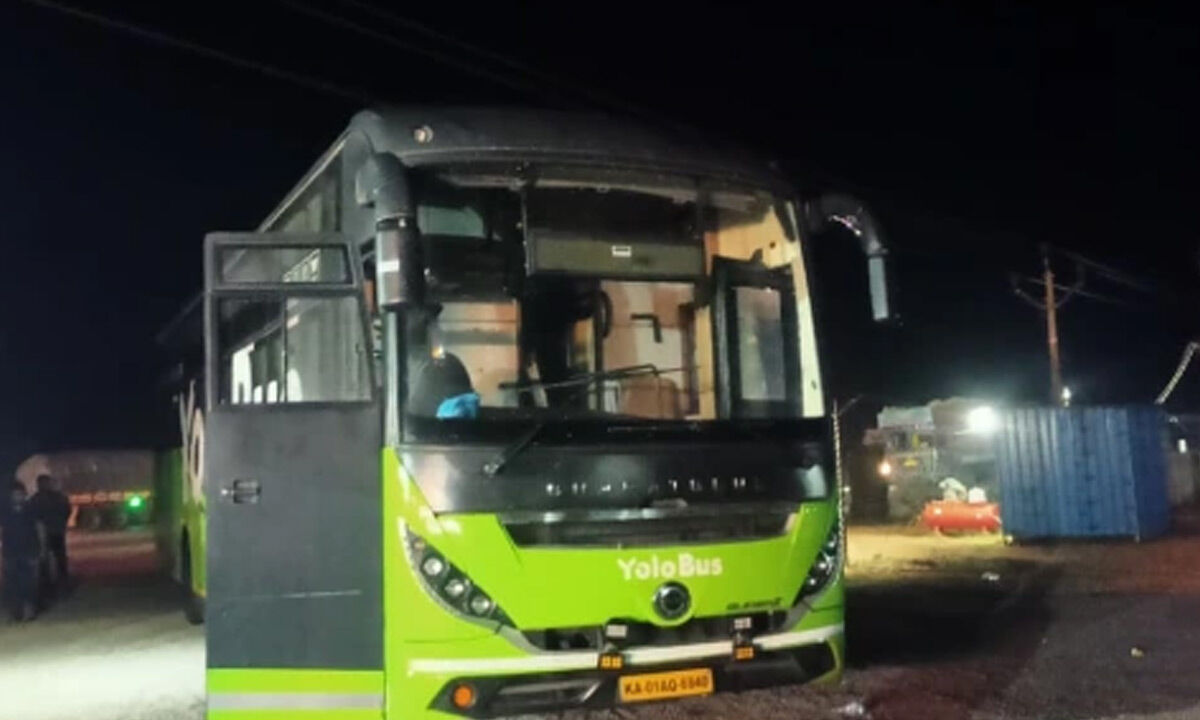 Smoke emanates from a bus on National Highway in Singarayakonda