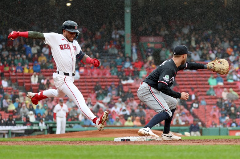 Twins complete 3-game sweep over Red Sox with a rain-soaked win