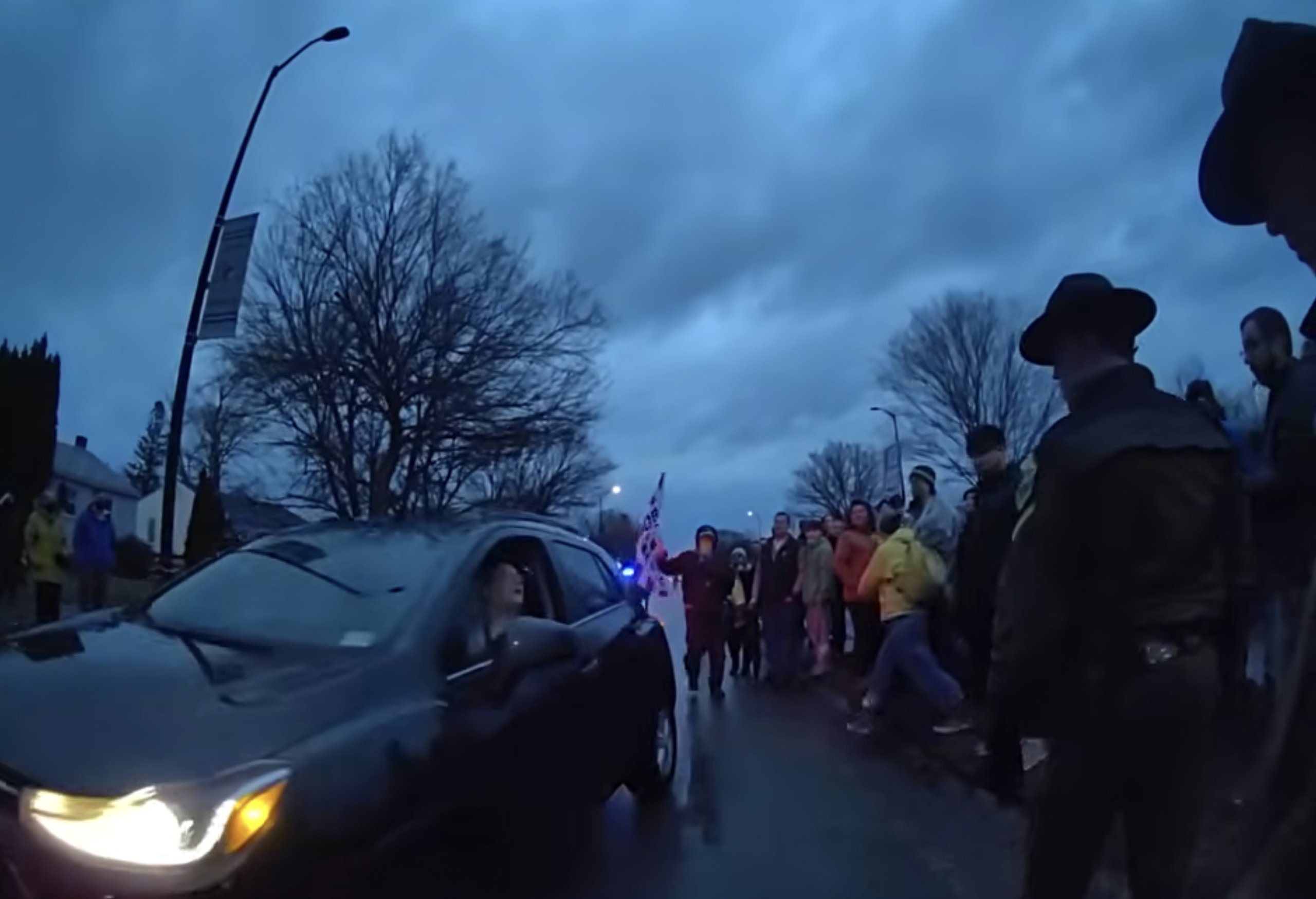 Woman Cited for Driving Toward Police and Protesters During ICE Raid