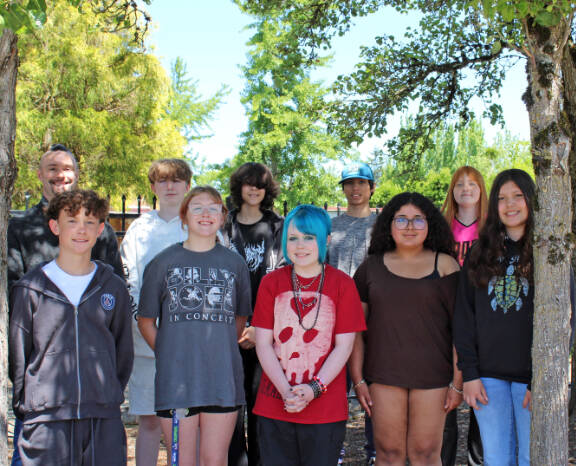 Lakewood Middle School eighth-grade students with teacher John Johansen, (back row, from left) True Salvador, Malia Mcallister, Julius Smith, Payton Kautzman; (front row from left) Maddox Mashita, Nevaeh Holm, Brooklyn Johnson, Jessilyn Raygoza-Suarez and Ava-Marie Najera. (Kristina Courtnage Bowman / Lakewood School District)