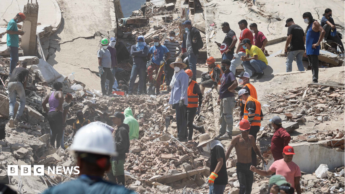 Volunteers conduct search operations in a building damaged by an earthquake in La Guaira, Venezuela, 29 June 2026. National and international rescue teams continue their efforts among the ruins of buildings in the coastal state of La Guaira, north of Caracas