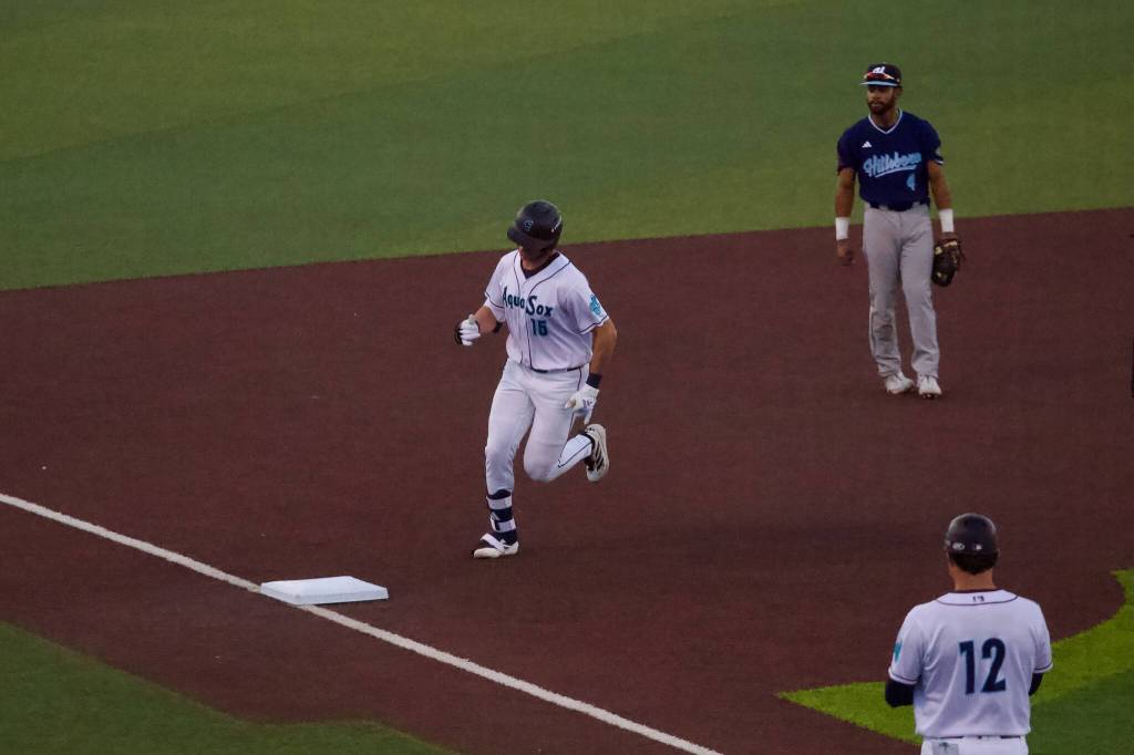 AquaSox outfielder Jonny Farmelo rounds third base after hitting a two-run home run in Everett’s 5-3 win against the Hillsboro Hops at Everett Memorial Stadium on June 17, 2026. (Joe Pohoryles / The Herald)