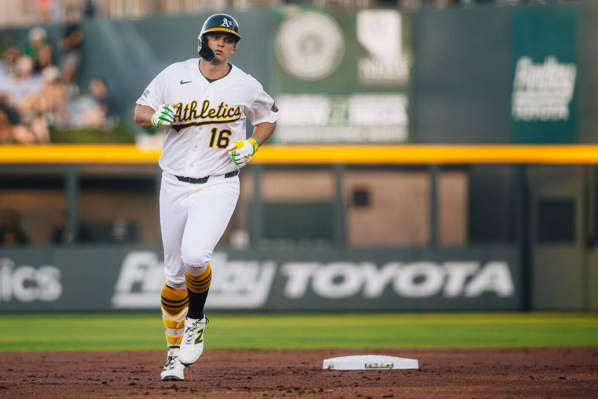 Athletics first baseman Nick Kurtz (16) runs home after scoring a home run during an MLB baseba ...
