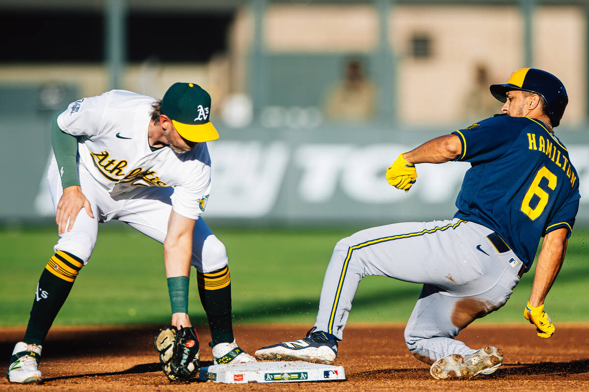 Milwaukee Brewers shortstop David Hamilton (6) makes it to second base before Athletics second ...
