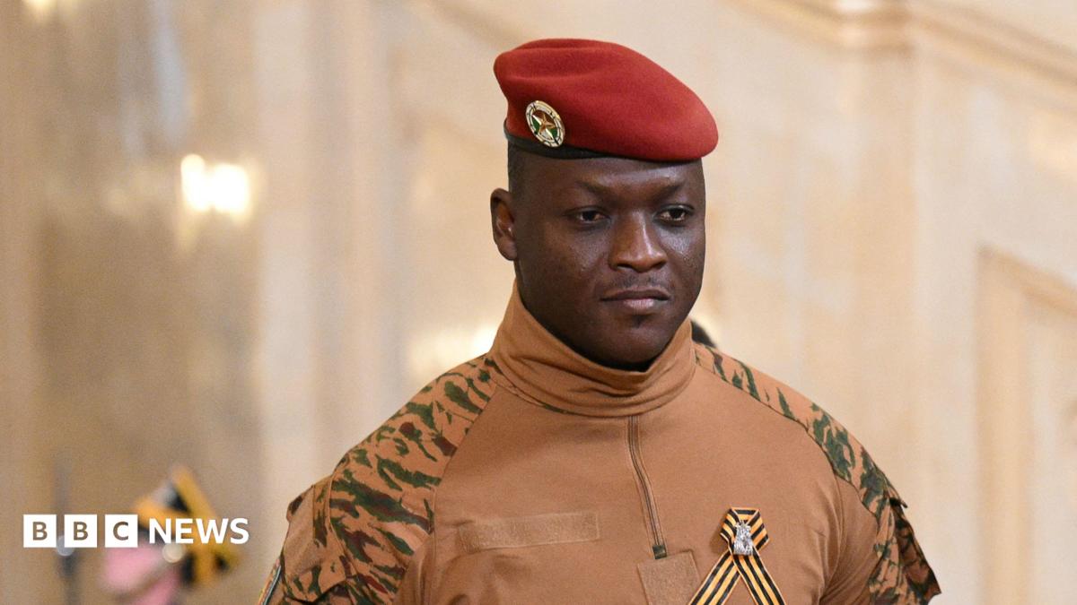 Burkina Faso's military leader Ibrahim Traore wearing a military uniform with a red hat