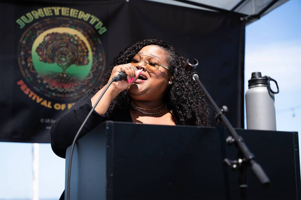 Erie Darby Wheeler sings “Life Every Voice and Sing” during a Juneteenth celebration on Friday, June 19, 2026, in Edmonds, Washington. (Will Geschke / The Herald)