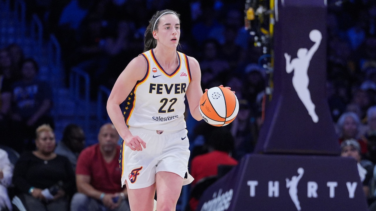 Caitlin Clark dribbling down court during Fever-Sparks (2026)