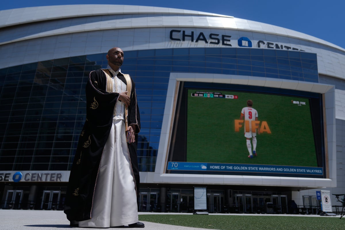 In a rainbow-trimmed robe at the World Cup, a gay Qatari doctor advocates for equal rights