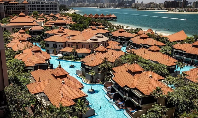 In one of world's richest cities, luxury hotels woo staycationers as tourists flee