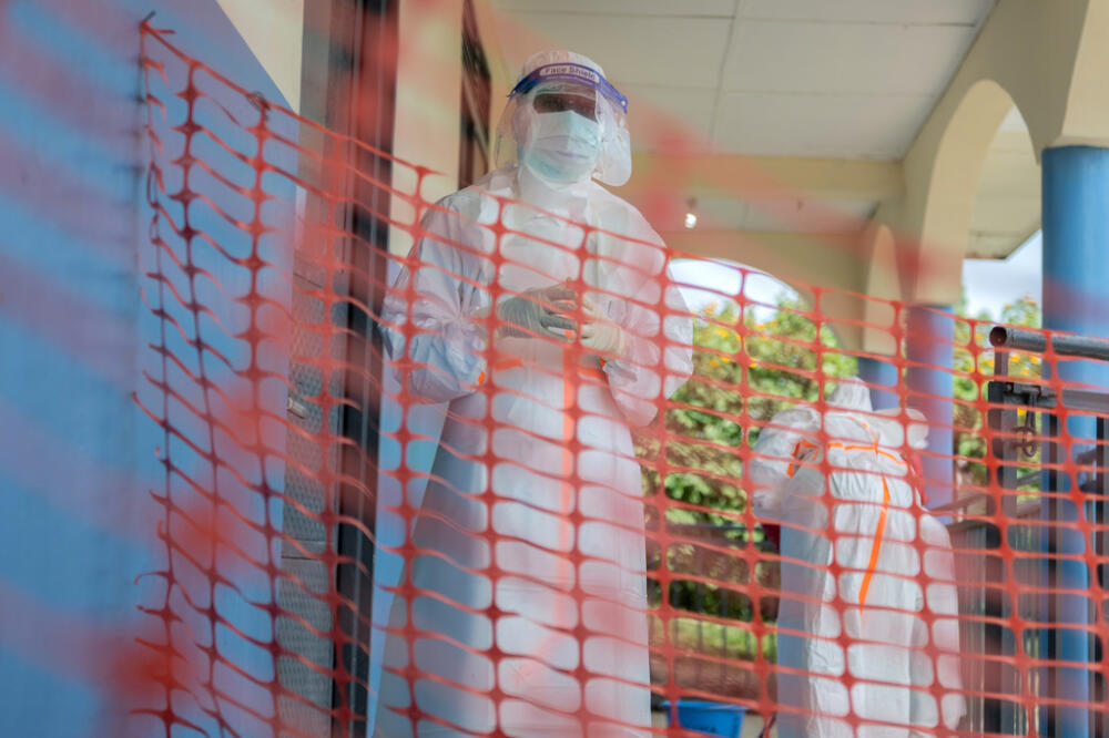 Health workers get ready to start their shift at the Ebola treatment center in Rwampara, Congo, Friday, May 29, 2026. (AP Photo/Moses Sawasawa)