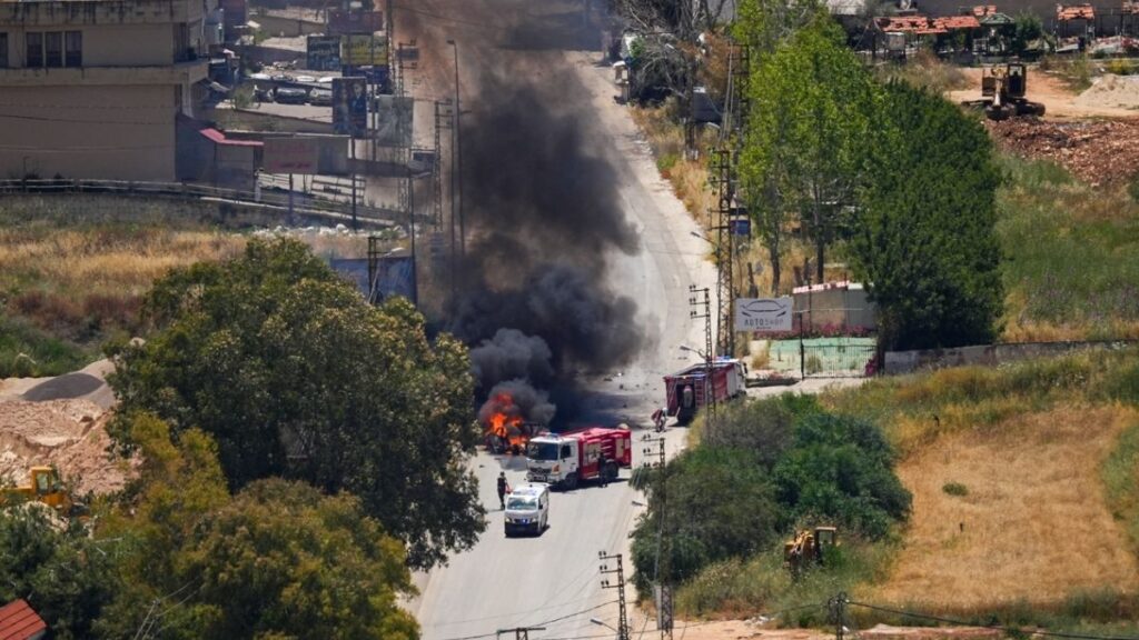 A burning vehicle targeted by an Israeli drone in Nabatieh, southern Lebanon, June 5, 2026 (AFP)