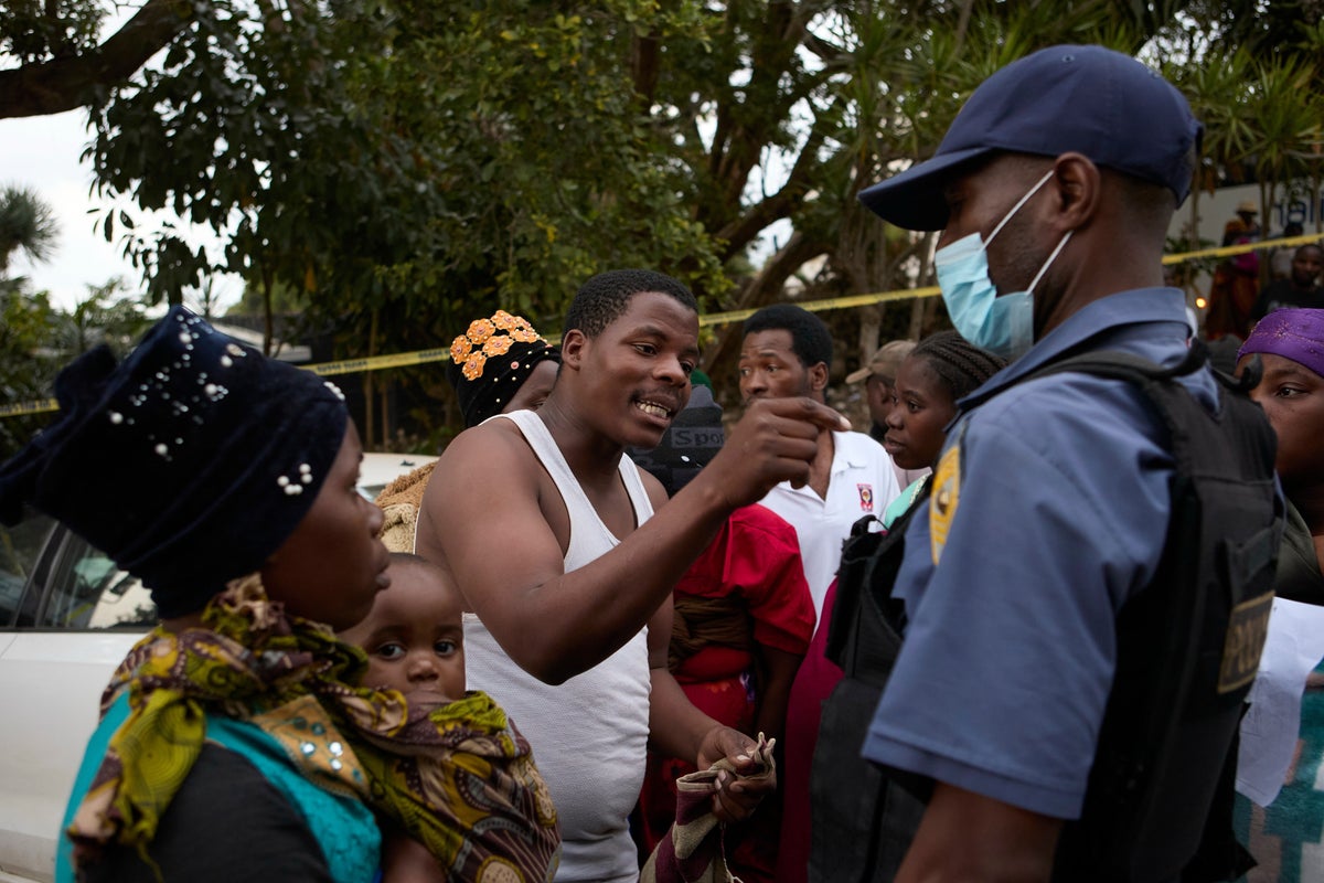 Migrants clash with police at a deportation site in South Africa where thousands have gathered