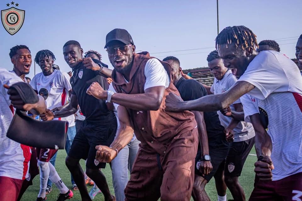 Omar Colley celebrates Division Two title with Colley Stars players