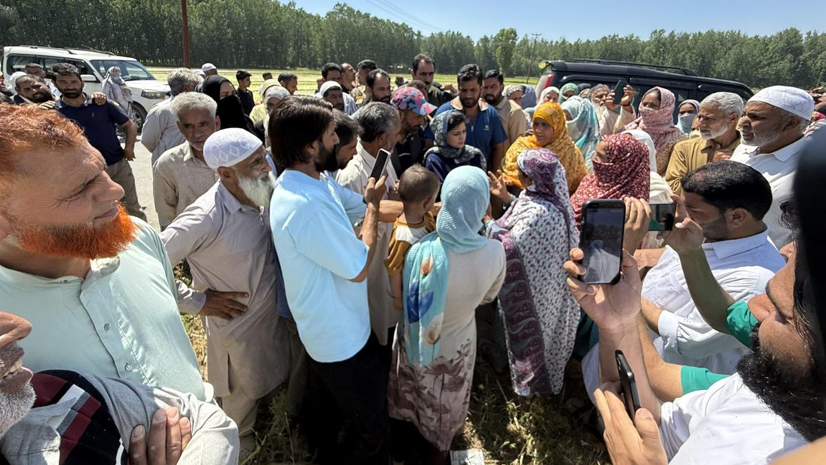 PDP leaders plough paddy fields to protest govt. takeover of land from farmers in Pulwama