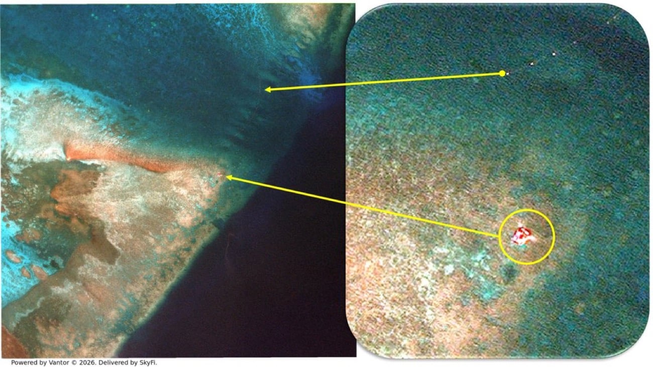 Satellite imagery taken on May 28 shows a reflective object near the southern entrance of Bajo de Masinloc's lagoon. The Armed Forces of the Philippines has said the object appears similar to a floating structure recently detected inside the shoal. (Photo courtesy of SeaLight/Ray Powell)