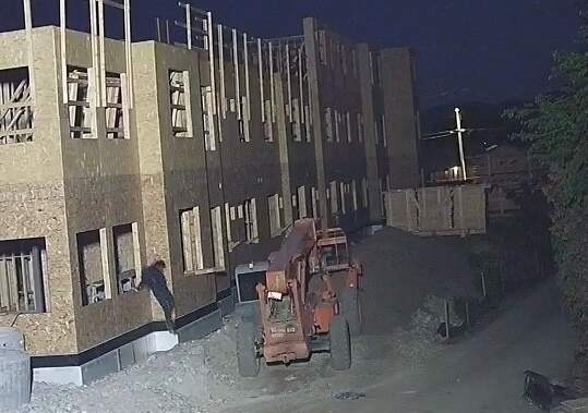 Photos show individual on Penticton construction site moments before destructive fire - Okanagan