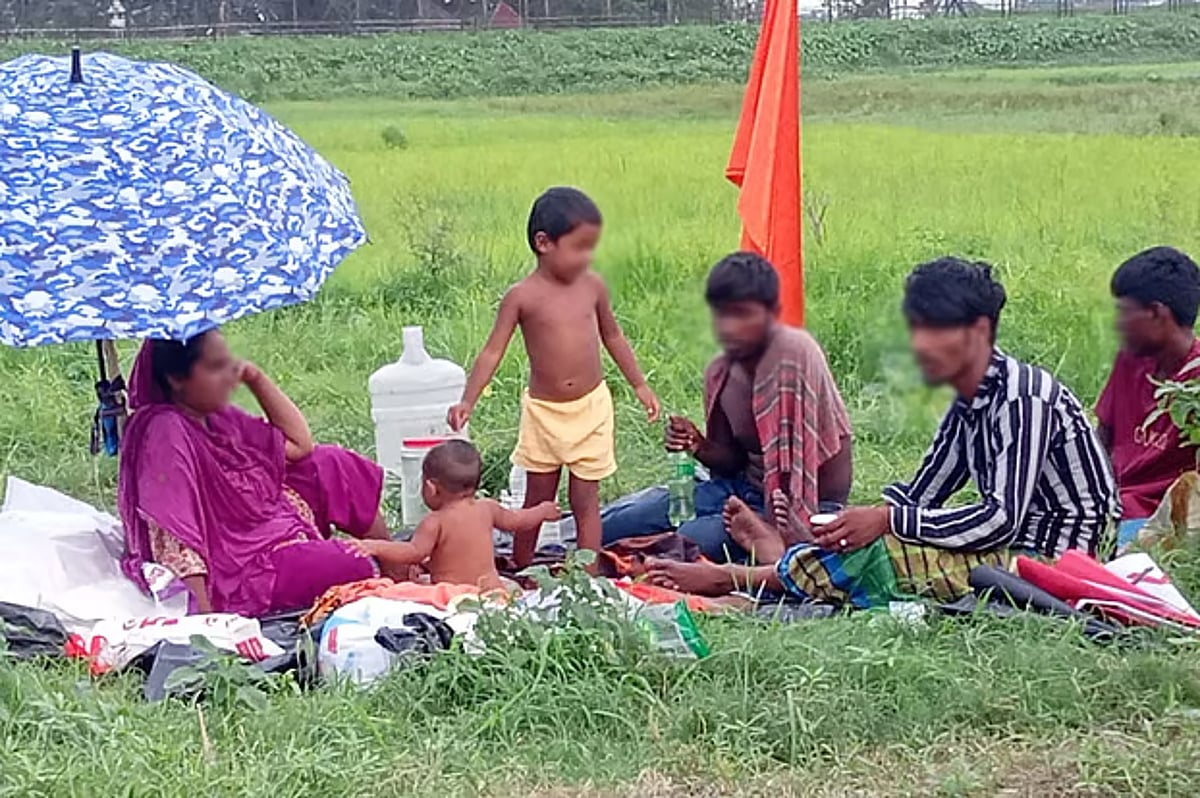 Stranded mother at border zero line, ‘Let our lives end but please save my children’