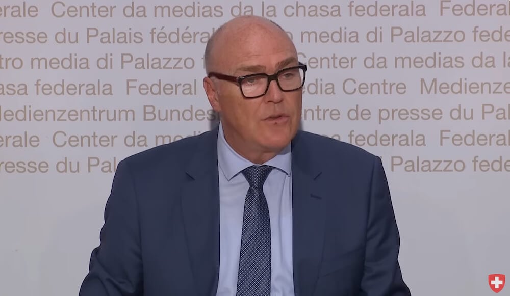 Swiss government trims defence tax increase