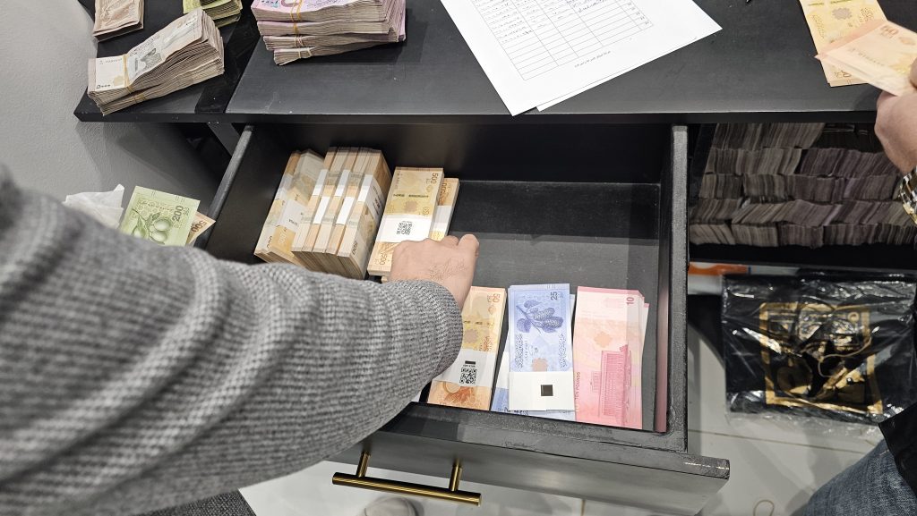 The central bank also narrowed the daily trading band from 15 percent to 9 percent.