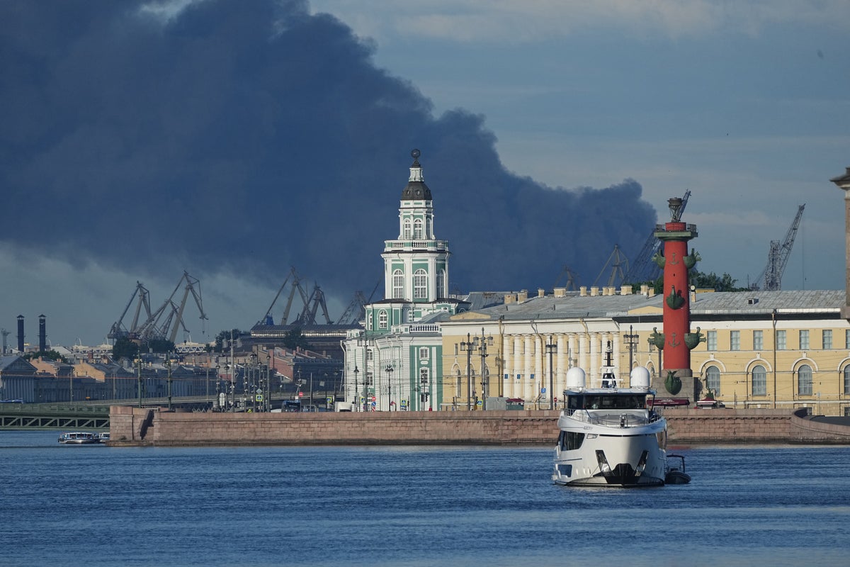 Ukrainian drones set fire to a St. Petersburg oil terminal ahead of Putin visit
