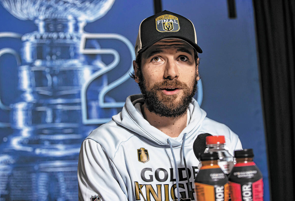 Golden Knights defenseman Shea Theodore (27) speaks during the Stanley Cup Final media day at L ...