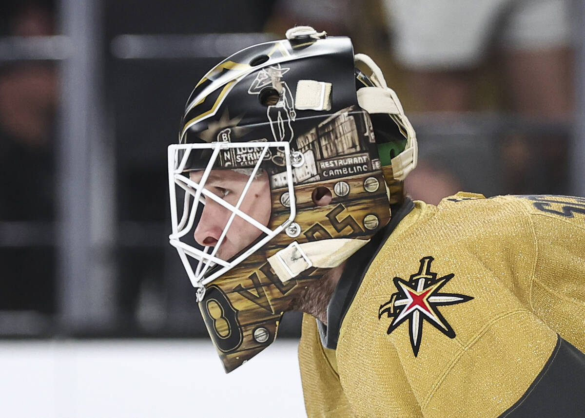 Golden Knights goaltender Akira Schmid (40) looks on during the second period of an NHL hockey ...