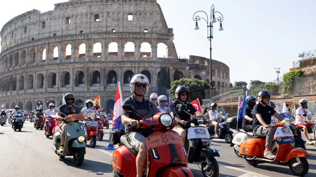 Vespa riders take to roads in Rome to mark 80th birthday