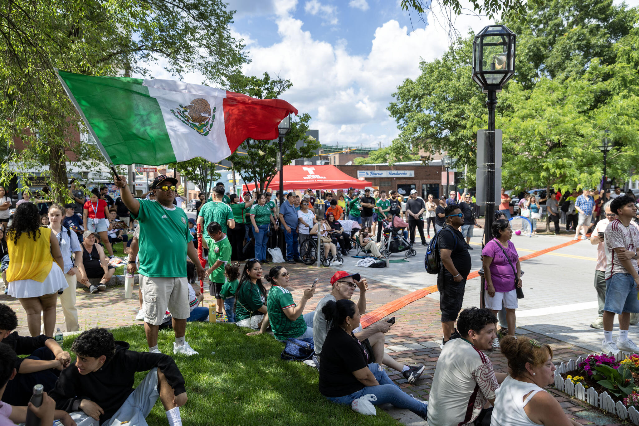 Soccer fans gathered in Chelsea Square to watch the first soccer game of the 2026 World Cup: Mexico vs. South Africa. (Robin Lubbock/WBUR)