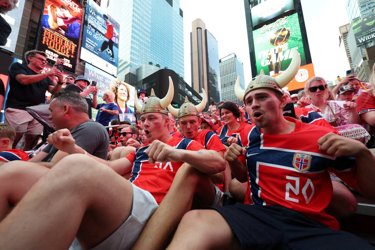 ‘We’re going to wake up the King!’: Norway fans take World Cup party to royal palace after famous win