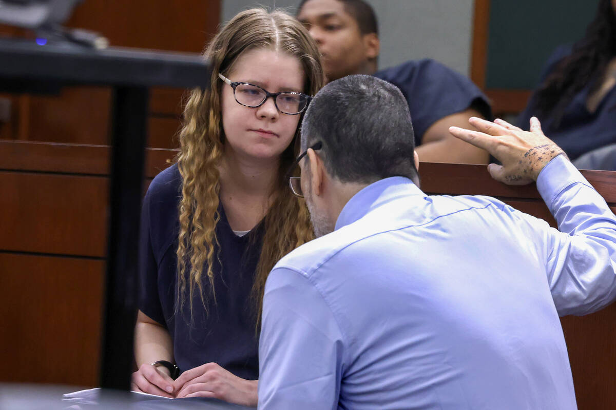 Alivia Bree Thrift, who is accused of starving her 14-month-old daughter to death, listens to h ...