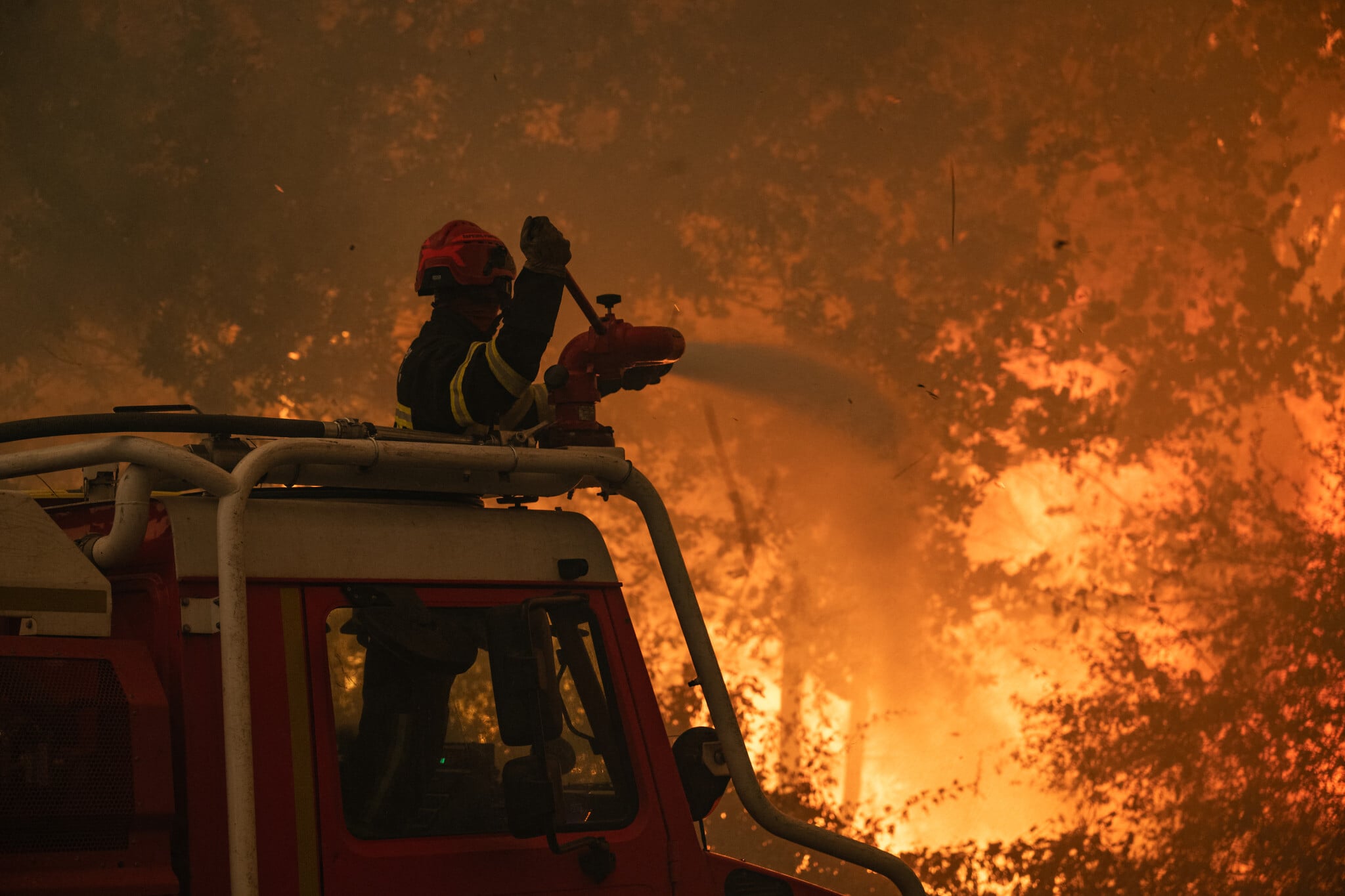 A quarter-million people flee their homes in France and Spain as wildfires burn