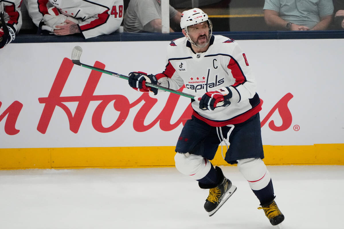 FILE - Washington Capitals left wing Alex Ovechkin (8) skates in the third period of an NHL hoc ...