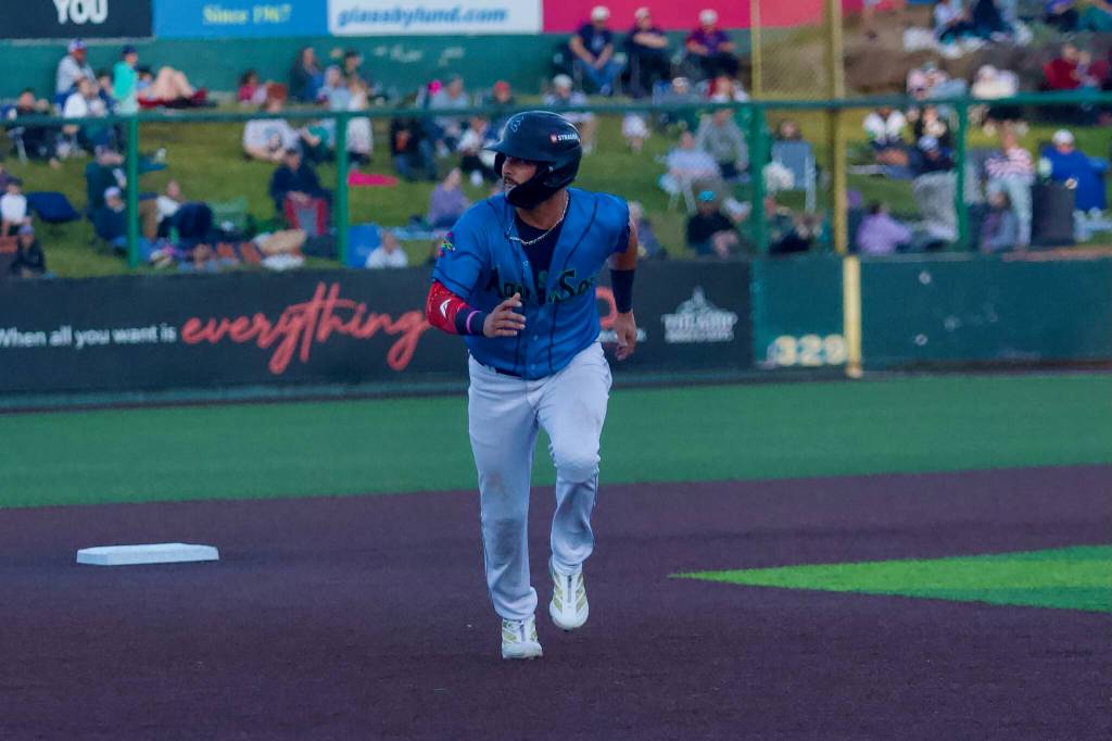 AquaSox infielder Austin St. Laurent runs to third base during Everett’s 6-3 win against the Tri-City Dust Devils at Everett Memorial Stadium on July 4, 2026. (Joe Pohoryles / The Herald)
