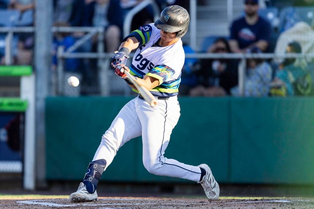 Luke Stevenson #32 of the Everett AquaSox hits a double to score Ricardo Cova #1 of the Everett AquaSox during the first inning against the Eugene Emeralds on Friday, July 24, 2026 in Everett, Washington. (Olivia Vanni / The Herald)