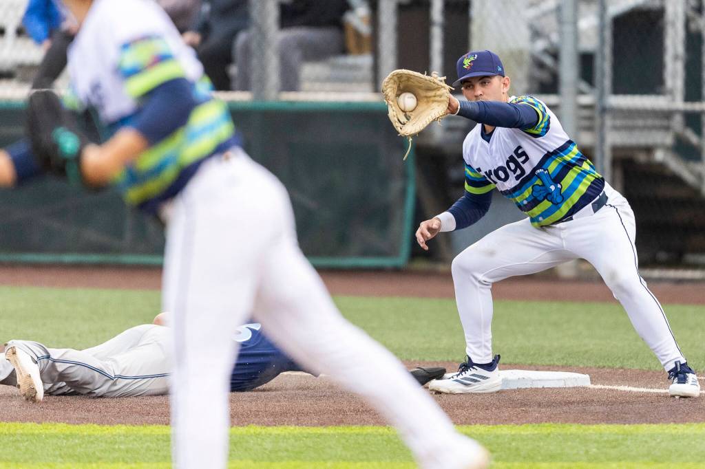 The AquaSox attempt a pickoff on Wednesday, May 6, 2026 in Everett, Washington. (Olivia Vanni / The Herald)