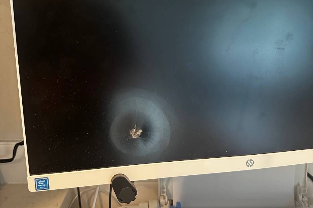A computer inside the Coker family’s home was hit by a bullet from stray gunfire on a neighboring property on Saturday, July 11, 2026 outside of Arlington, Washington. (Courtesy of Sarah Coker)