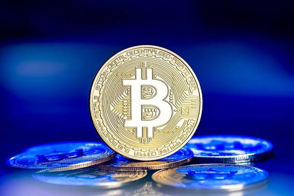 Bitcoin near $66,000 as ETF inflows signal institutional demand recovery