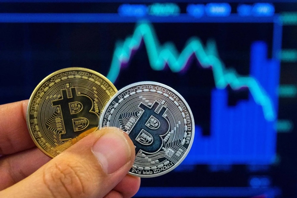 Bitcoin rises above $65,000 as global market concerns ease